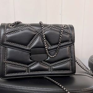 Black chain link shoulder purse